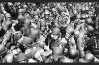 LCT Utah - Members of the 101st Airborne Infantry Division and the 4th Infantry Division crowd aboard an LCT on the way to Utah Beach, June 6, 1944.