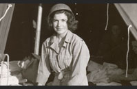 Army Nurse - An Army nurse works in a field hospital. Nurses began landing on the Normandy beachhead four days after the initial invasion. The first to arrive were members of the 42nd and 45th Field Hospitals and the 91st and 128th Evacuation Hospitals. Image courtesy of National Archives, 111-SC-190305